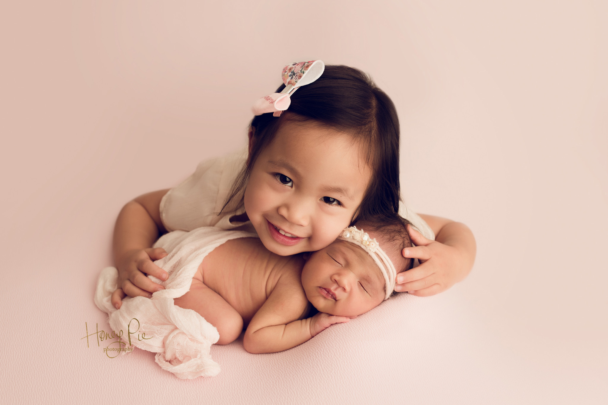Sibling love with big sister & her newborn baby sister during Worthing Photographer photoshoot