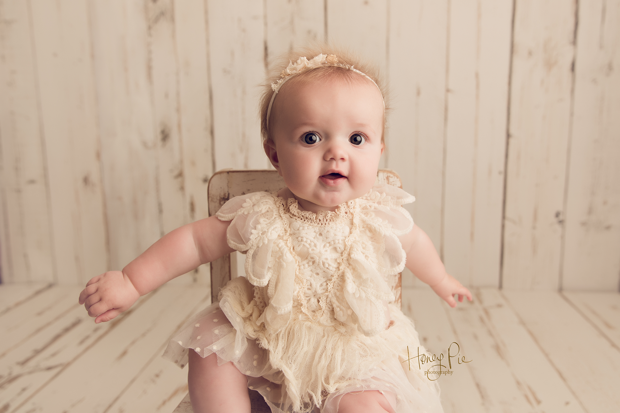 Wide eyed baby during Brighton Baby Photoshoot
