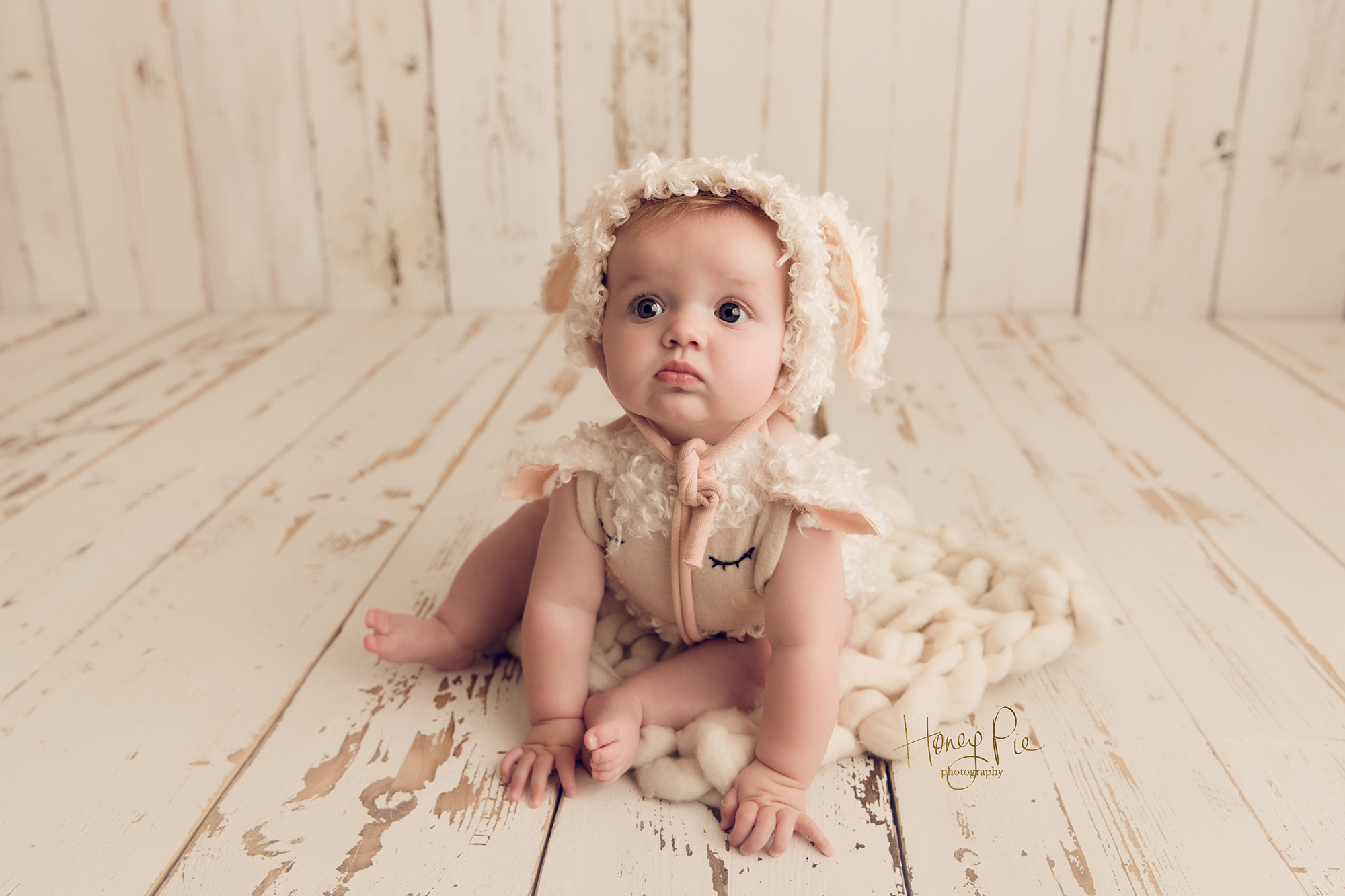 Baby dressed as a lamb with brighton photographer
